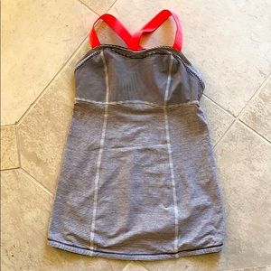 Lululemon Grey tank with bright orange straps.